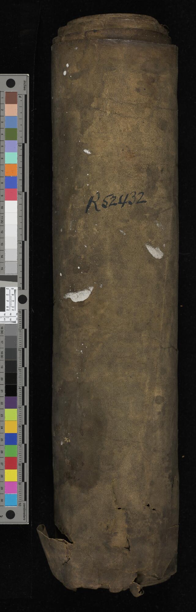 Rolled scroll and black case, Manchester Hebrew MS 22 (Pescarol Esther Scroll)
